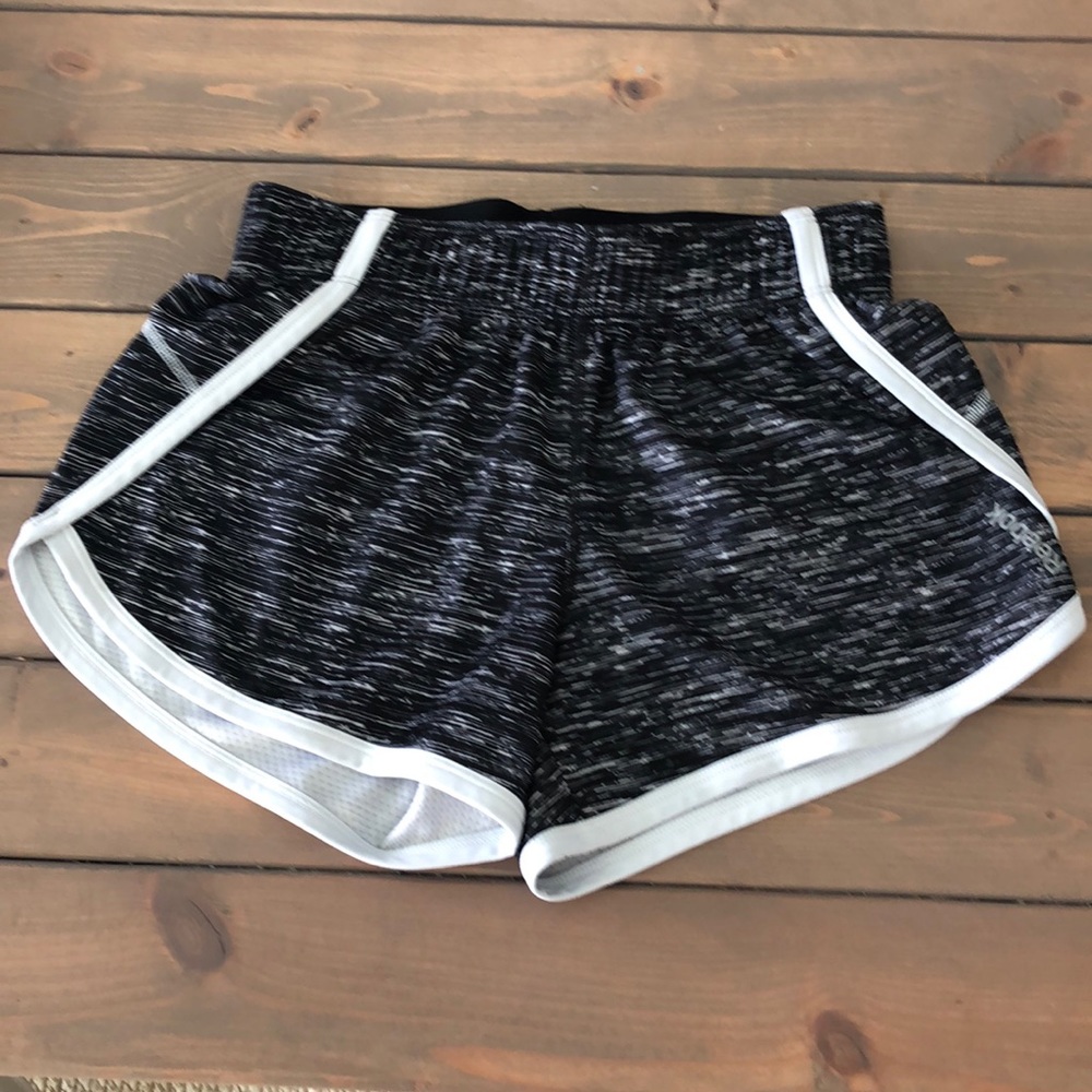 Black and white Reebok running shorts